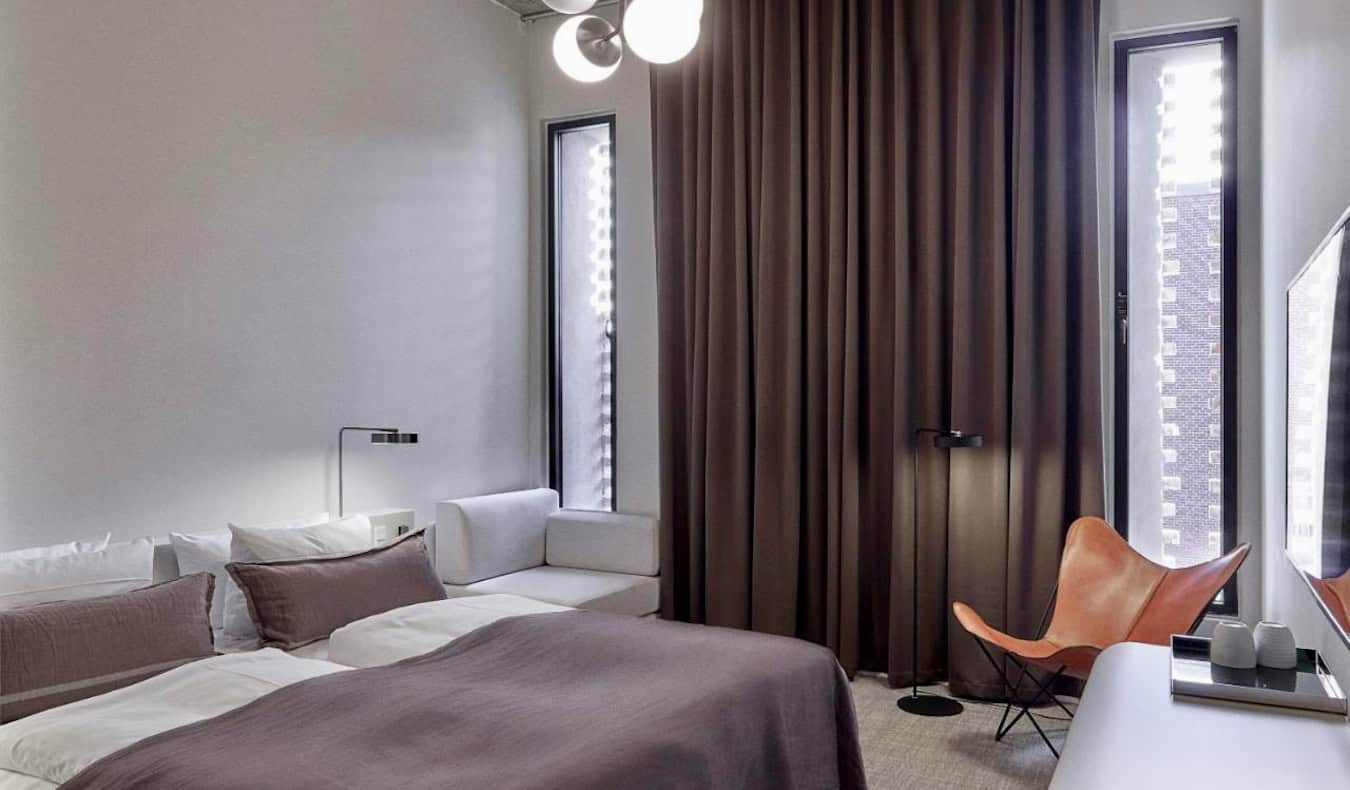 A bright and spacious hotel room at Hotel Ottilia in Copenhagen, Denmark