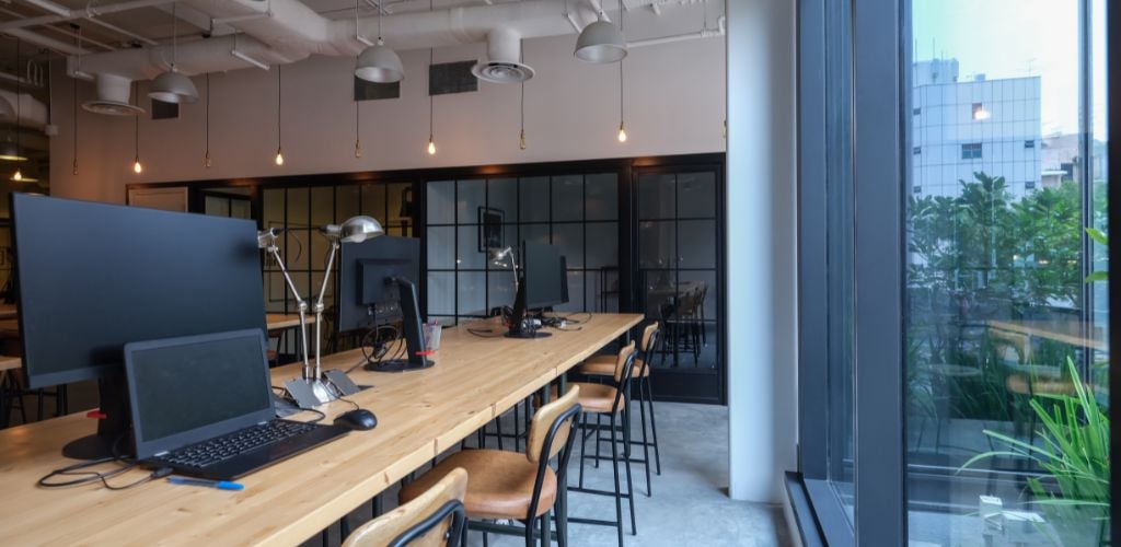 modern coworking space with city view and high seating stalls 
