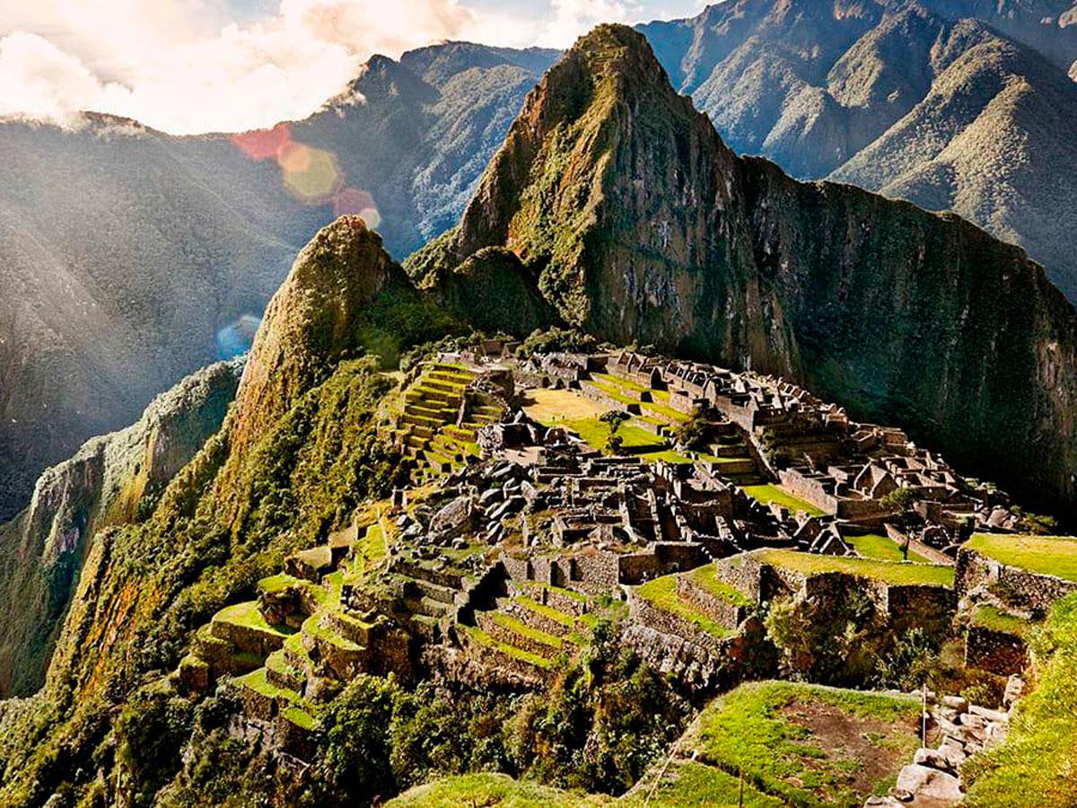 Arriving at Machu Picchu: Train vs. Path